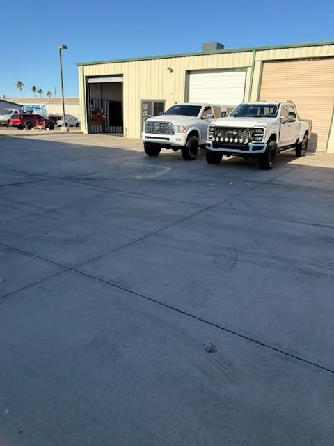 Fleet of work trucks outside Modern Diesel Solutions in Lake Havasu City